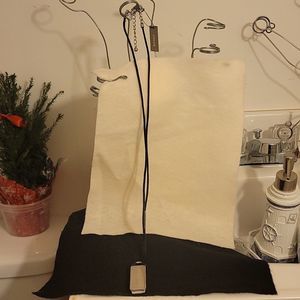 NWT, Chicos, Long blk cord with silver Toned bar on cord  adorned 2.5 Silver Bar